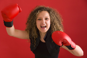 beautiful female boxer on red