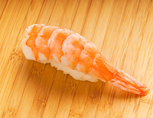 King shrimp sashimi on a bamboo plate