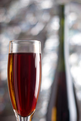 Bottle and glass of red wine