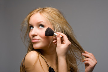 Fototapeta premium Portrait of a beautiful young blond female