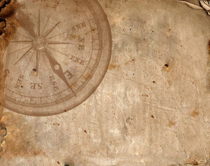 Fototapeta na wymiar Compass on the old paper