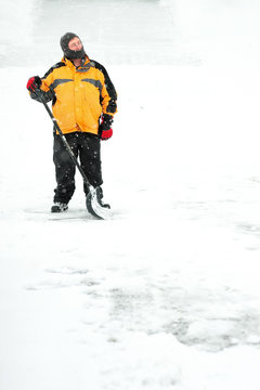 Man Shoveling Snow