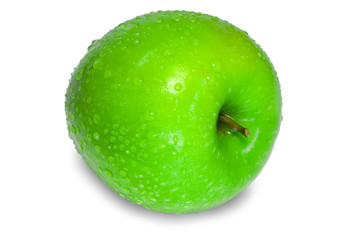 A fresh green apple with water drops over white