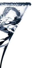 martini glass silhouette with ice cubes sugar crystall and some