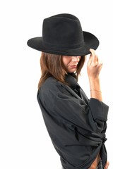 Fototapeta na wymiar girl in a black shirt and a cowboy's hat