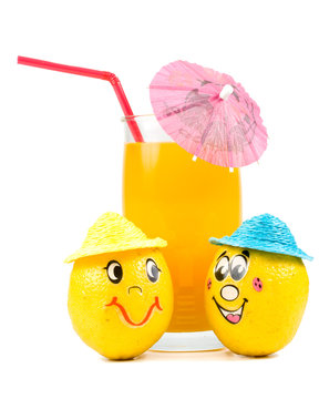 Cheerful little men from a fresh lemon and a juice glass