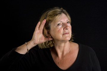 Shot of a Senior Lady with her Hand to Ear