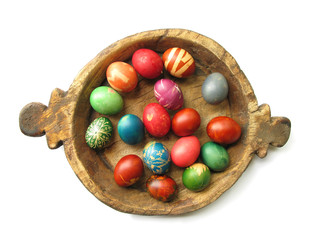 Easter eggs in old wooden dish	