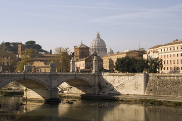 Fototapeta na wymiar Tiber River with Saint Peter's Dome. Rome, Italy.
