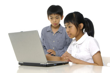 kids playing computer games or learning online