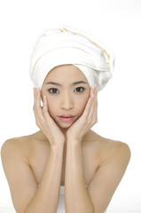  Beautiful woman wearing white towel on her head