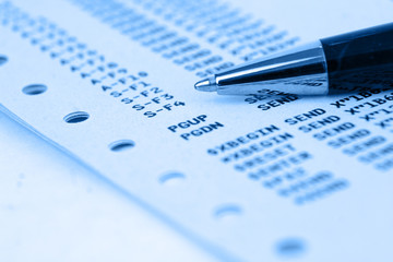 Mainframe computer paper with blue overlay