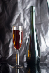 Bottle and glass of red wine