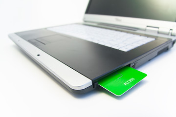 notebook with green access card