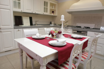 served table in interior of the modern kitchen