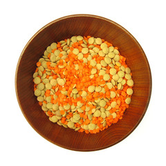Lentil daal pulse orange and green in wooden dish