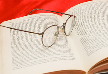 glasses and book