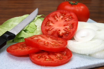 Obraz na płótnie Canvas Tomato, Lettuce, and Onions