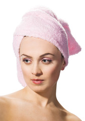 beautiful woman wearing pink towel on her head