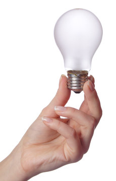 Female hand holding bulb Isolated on white background.
