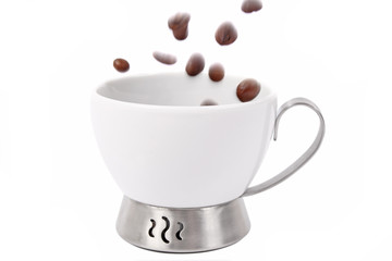 Cup and coffee beans isolated on white background