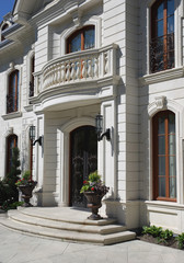Fototapeta na wymiar elegant house entrance with balcony