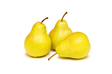 Three yellow pears isolated on the white