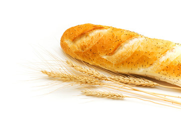 Bread and wheat ears isolated on white