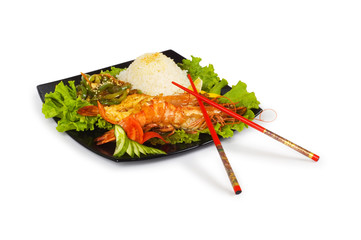 Grilled lobster, rice and vegetables isolated on white