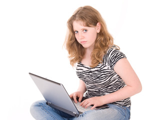 Naklejka premium teenager girl working on laptop
