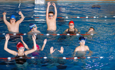 .childrens having fun in a swimming pool