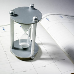Hourglass and planner