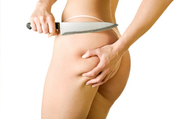 girl cut off her cellulite, isolated on white