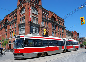 Fototapeta na wymiar articulated electric streetcar tram in Toronto