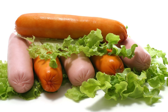 fresh sausages over white