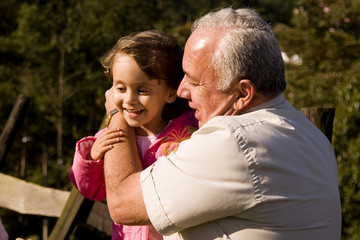 Fototapeta premium Grandfather and granddaughter
