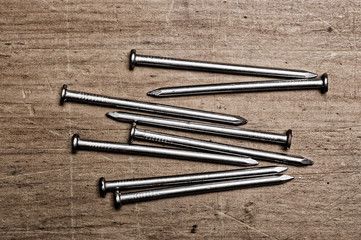 nails on wooden table.