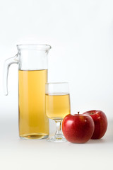 apple juice with two red apples, isolated