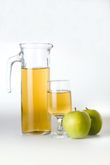 apple juice with two green apples, isolated
