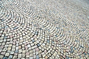 stone block paving with different colors of stones
