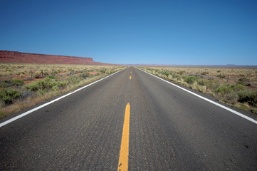 Desert road in Arizona under Vermilion Cliffs (Route 89A)