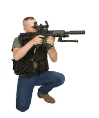 Fototapeta premium Kneeling paint paint ball warrior