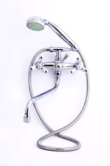 Obraz premium Photo of chrome metal shower. Isolated on white background.