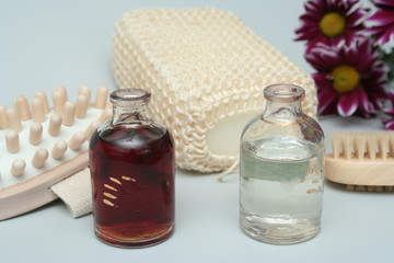 Cosmetic accessories and two bottles with oil and 
