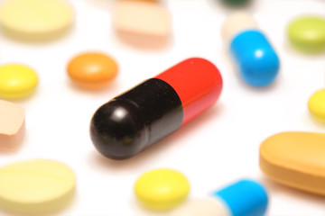 Painkiller pills isolated against white background