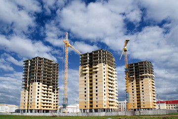 Fototapeta na wymiar Construction of three buildings