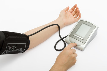 Checking the blood pressure with a modern digital equipment.