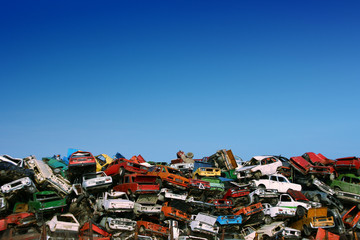 Pile of used cars in junkyard, ready for salvage - obrazy, fototapety, plakaty