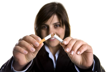 young woman breaking cigar - anti-tobaco concept