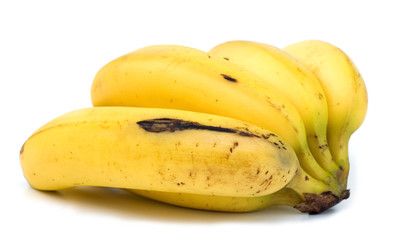 very ripe bananas on white background